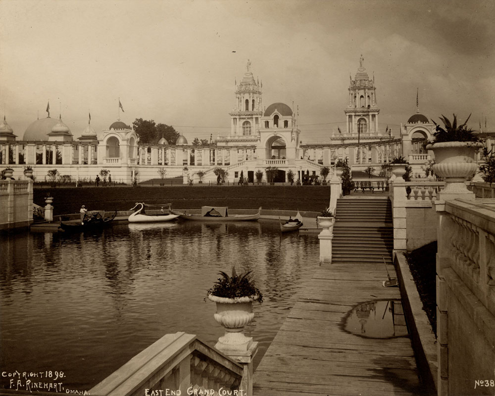 East section of Grand Court. Northeast stairs leading to lagoon. Gondolas and swan boat in lagoon. Twin Restaurants visible behind Grand Colonnade.