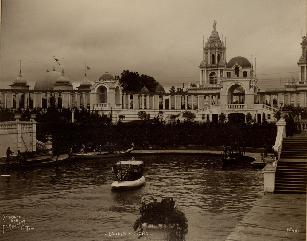 East end of Lagoon, with Gondolas and Swan boat. Moorish Palace and Twin Towers Restaurants visible behind Grand Colonnade.