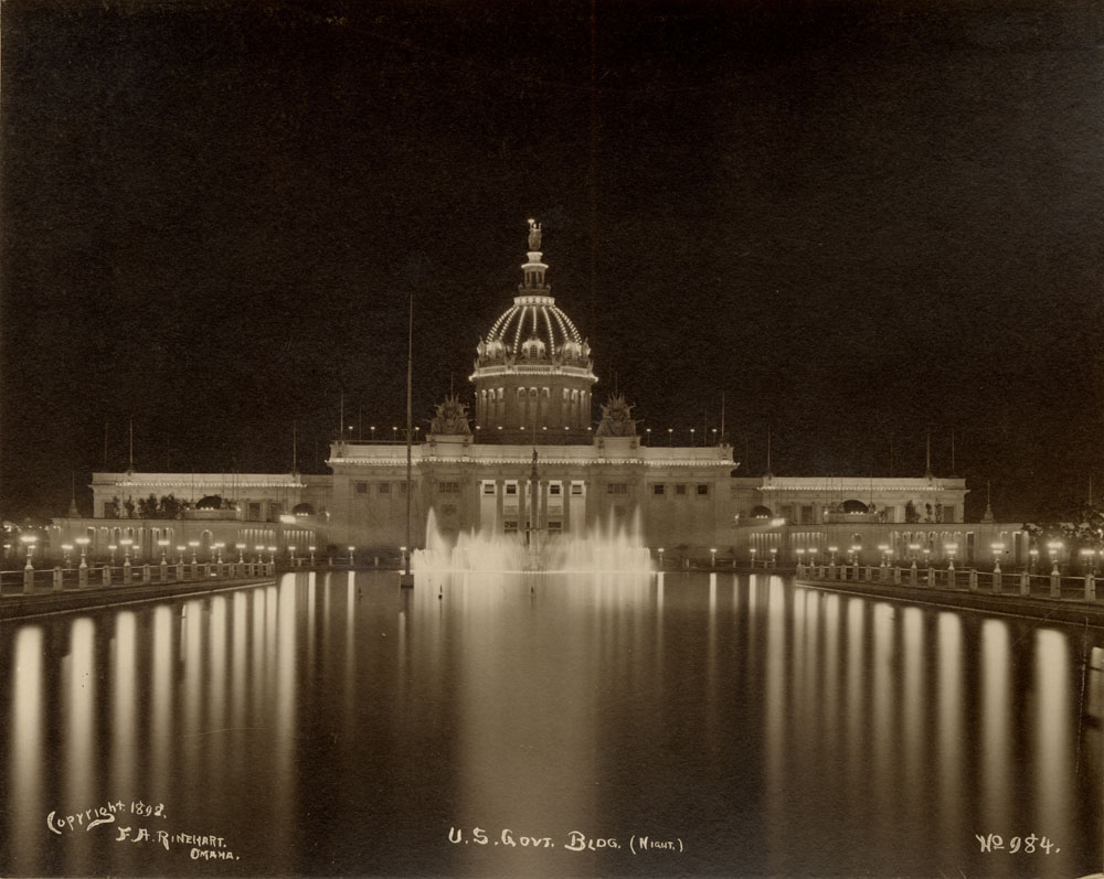 U.S. Government Building at night, looking directly west. Fountain of Neptune turned on.