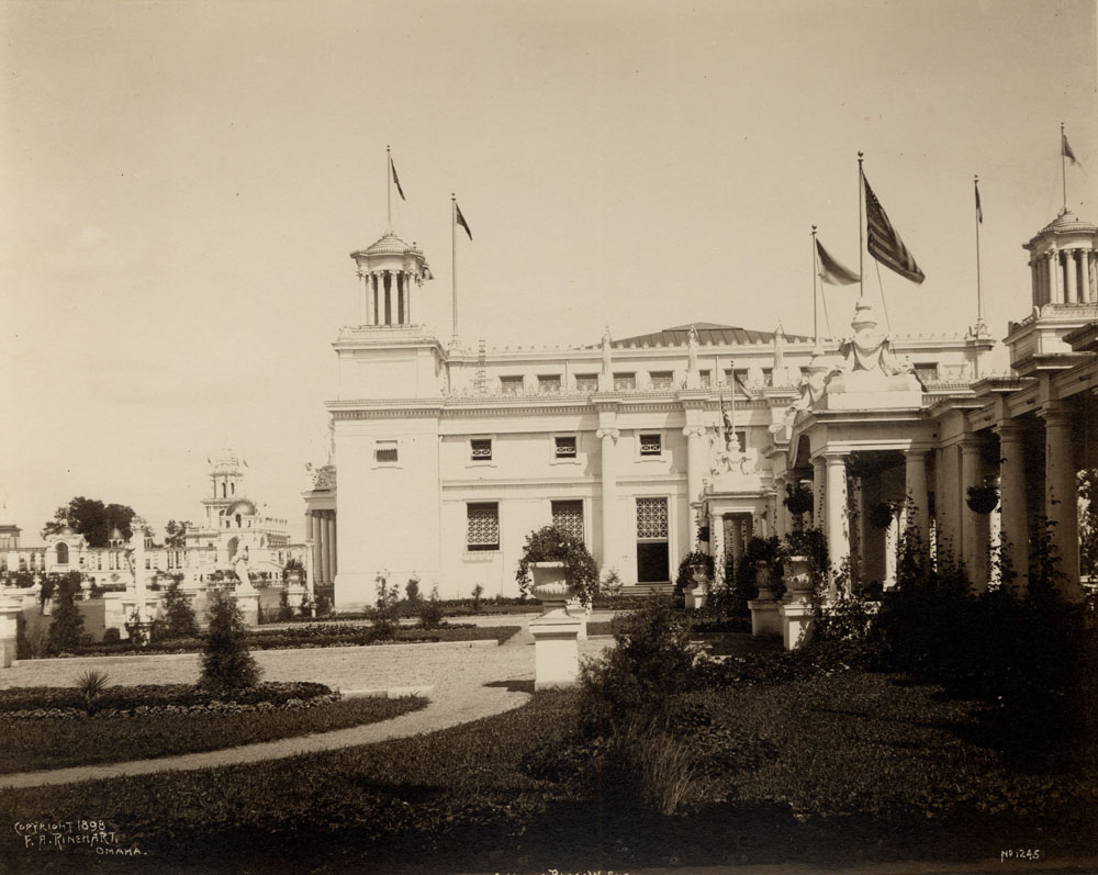 Northwest side of Mines and Mining Building, with colonnade and courtyard. Grand Colonnade and Twin Towers Restaurants visible to the east.