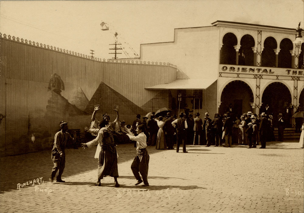 Performers outside Oriental Theater on Streets of Cairo.