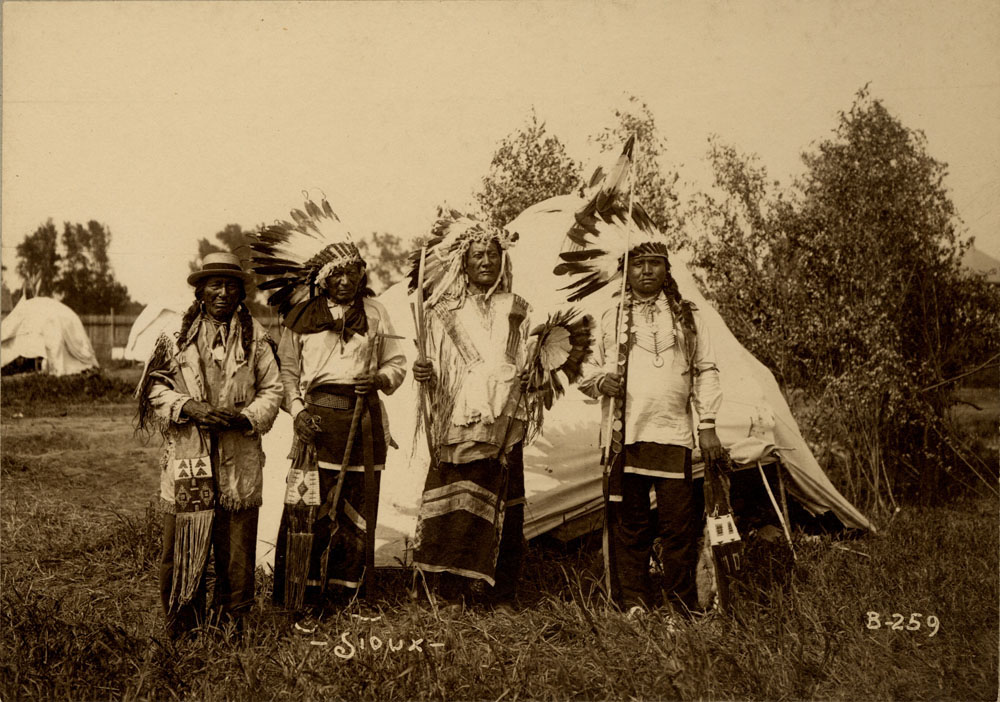Group Portrait of Indian Congress Participants. Sioux Delegates. Unidentified Man, Unidentified Man, High Bear, Unidentified Man