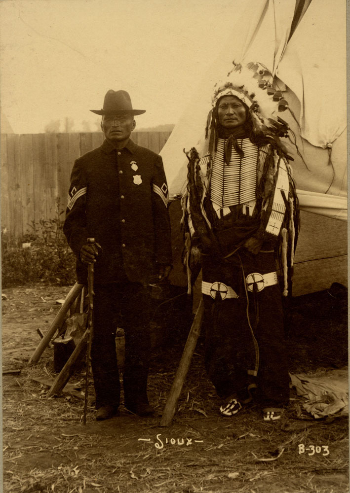Group Portrait of Indian Congress Participants. Sioux Delegates. Capt. James Black Eagle [Waubli Sapa] and Chief Goes to War