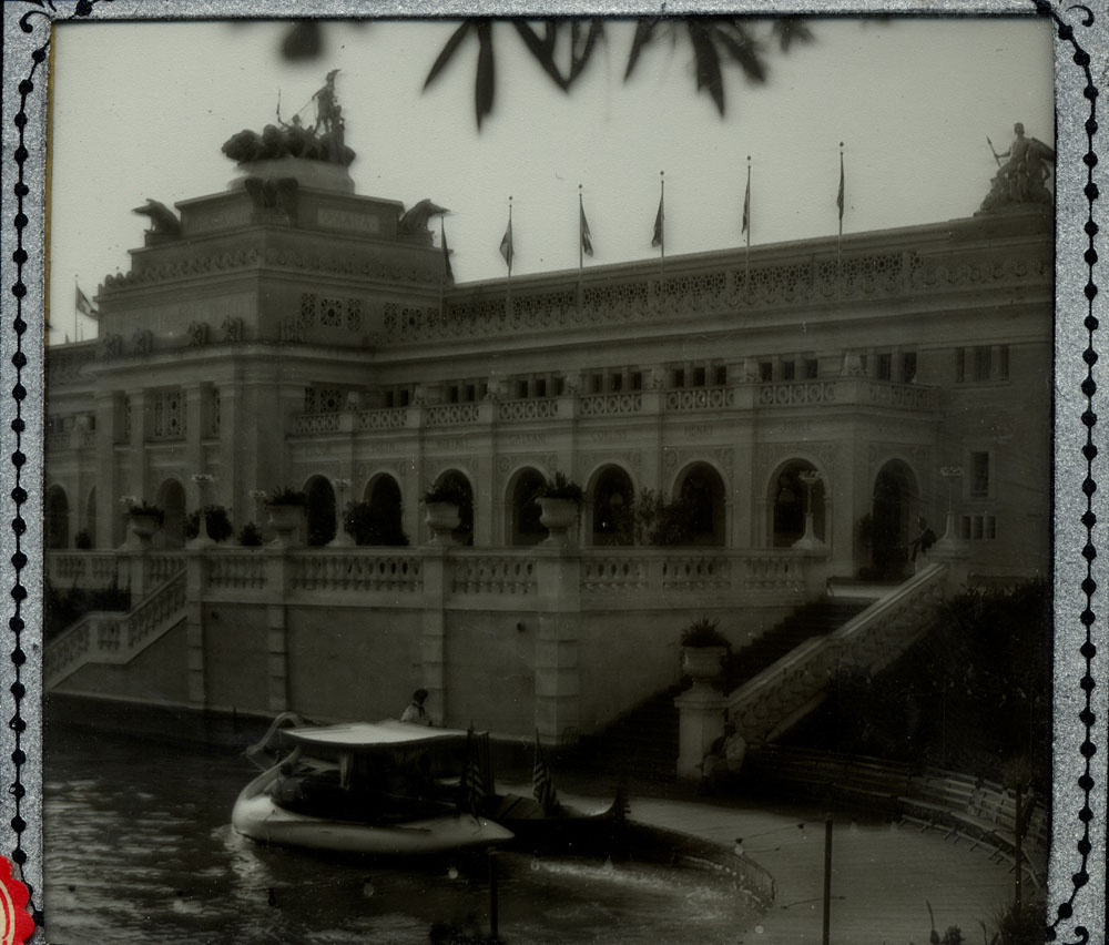 Machinery & Electricty Building looking northwest. Swan boat in lagoon.