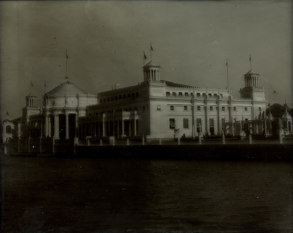 Northwest Corner of Mines and Mining Building with colonnade looking southeast across lagoon. Small portion of Grand Colonnade visible to the east.