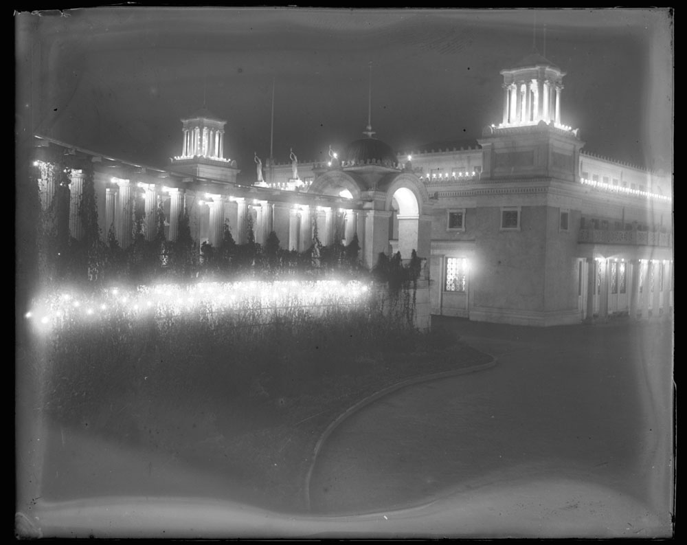 Night view of northeast corner of Mines and Mining Building and Grand Colonnade to the east.