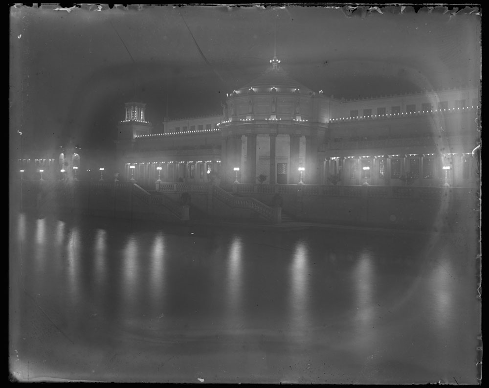 Night view of Mines and Mining Building looking southeast from across lagoon.